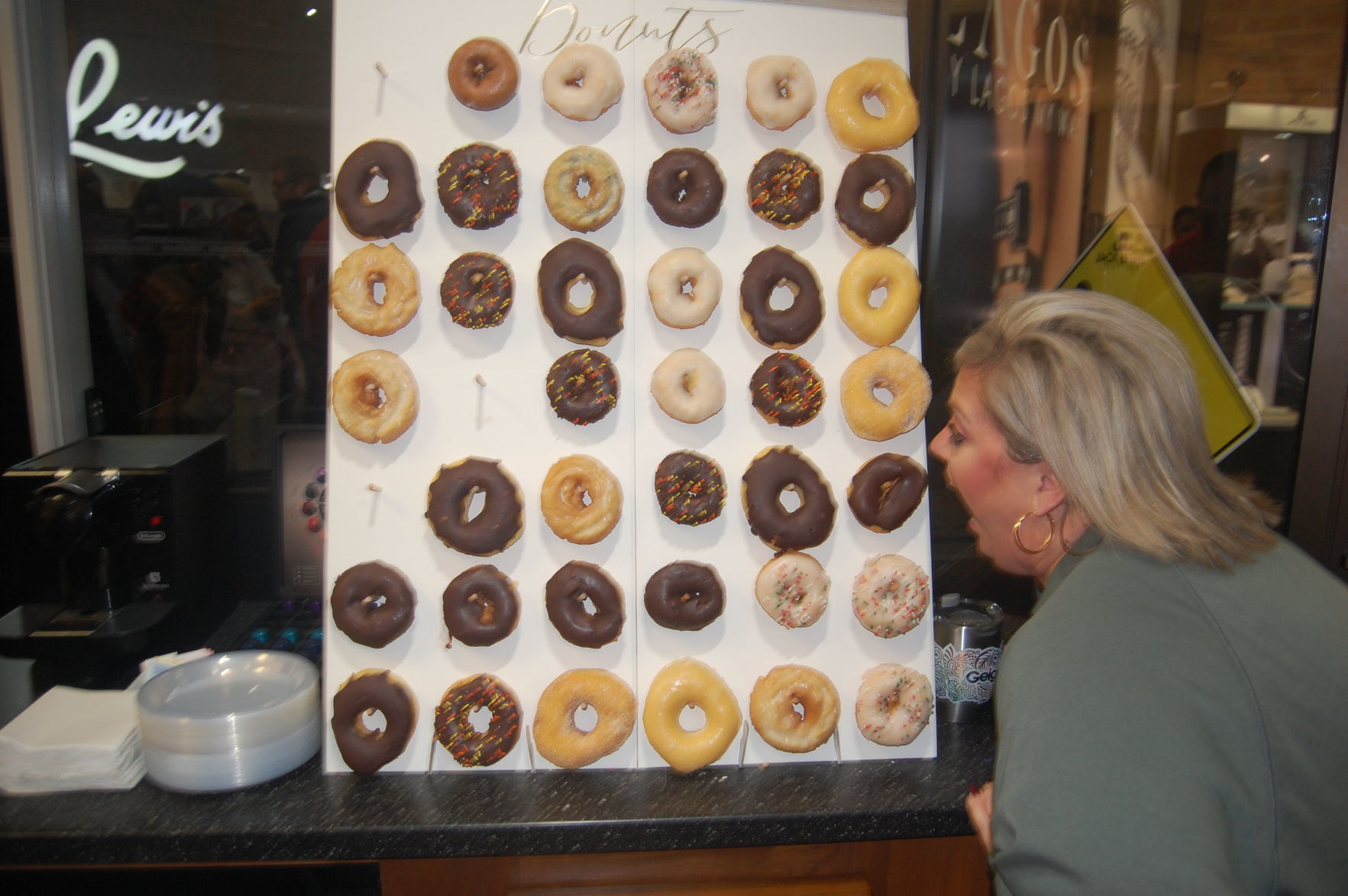 Kim Schoenbein bobbing for donuts